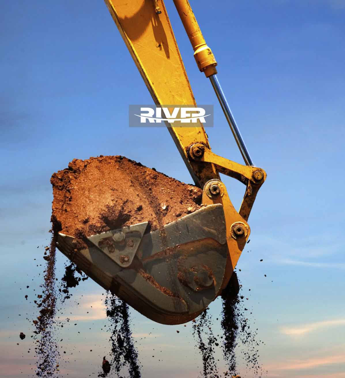 Excavator lifting dirt.