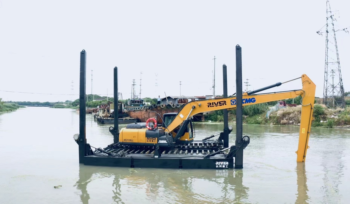 Amphibious excavators working in the sea