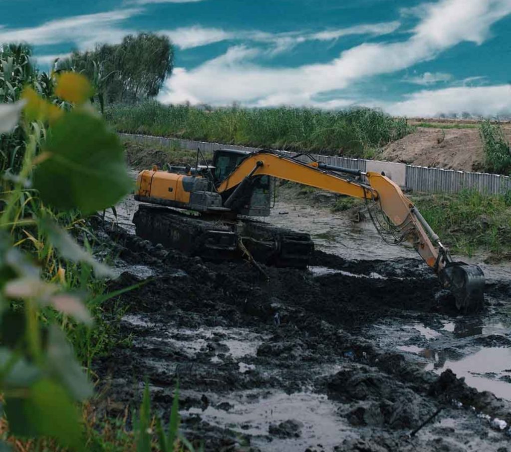 Excavators Are Carrying Out Dredging Work in the River
